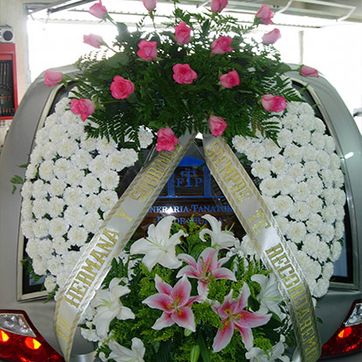 Tanatorio Piedrabuena - Porzuna corona en carro fúnebre 